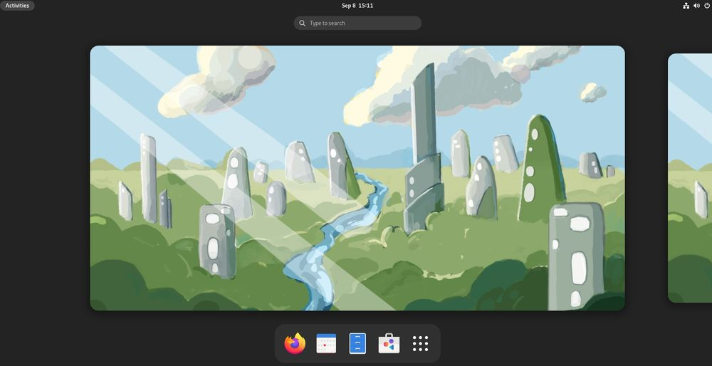 fedora 37 screenshot with paint-style wallpaper with green grass, rocks posing as buildings, with a river in the middle