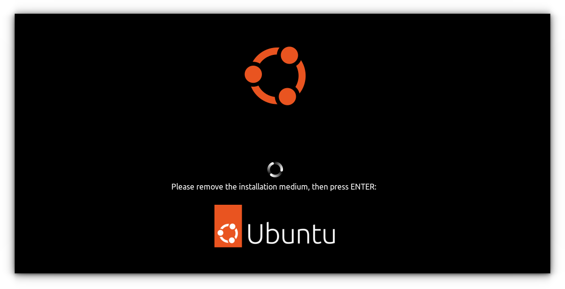 Once installation is finished and the restart button is pressed, you are asked to remove installation medium and press Enter
