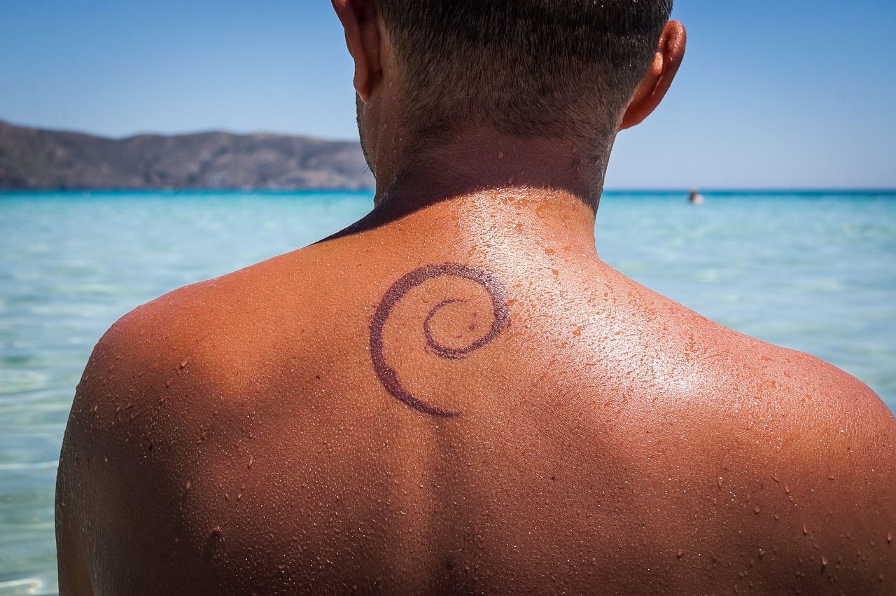 Debian tattoo on the back neck