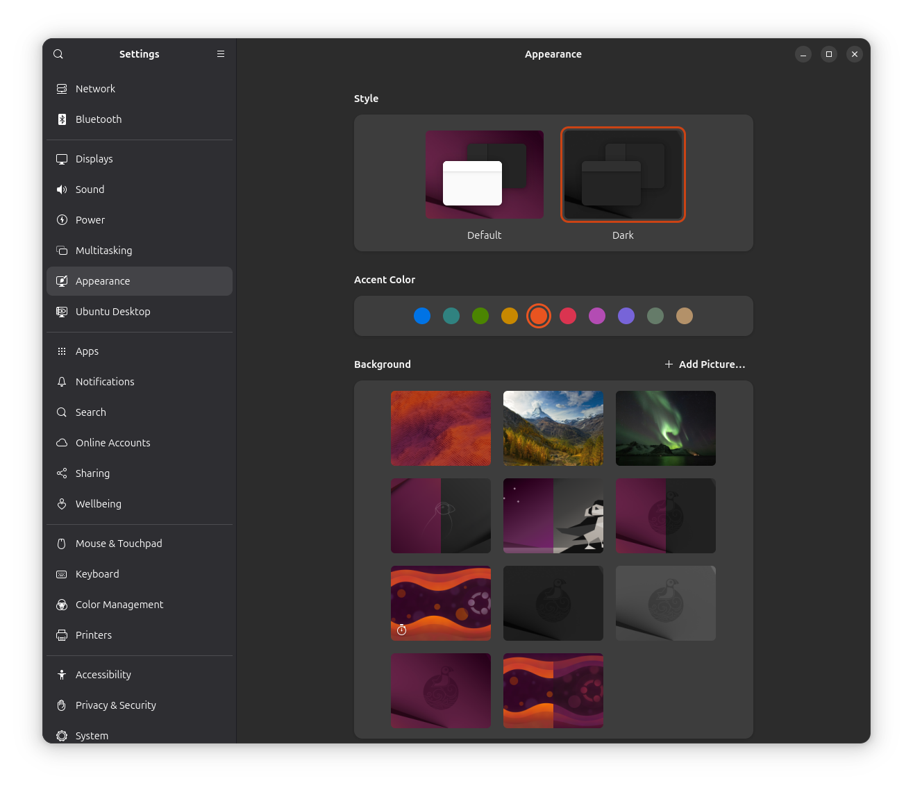 a screenshot of the appearance menu on ubuntu 25.04 that is showing the new wallpapers under the sub-heading called background