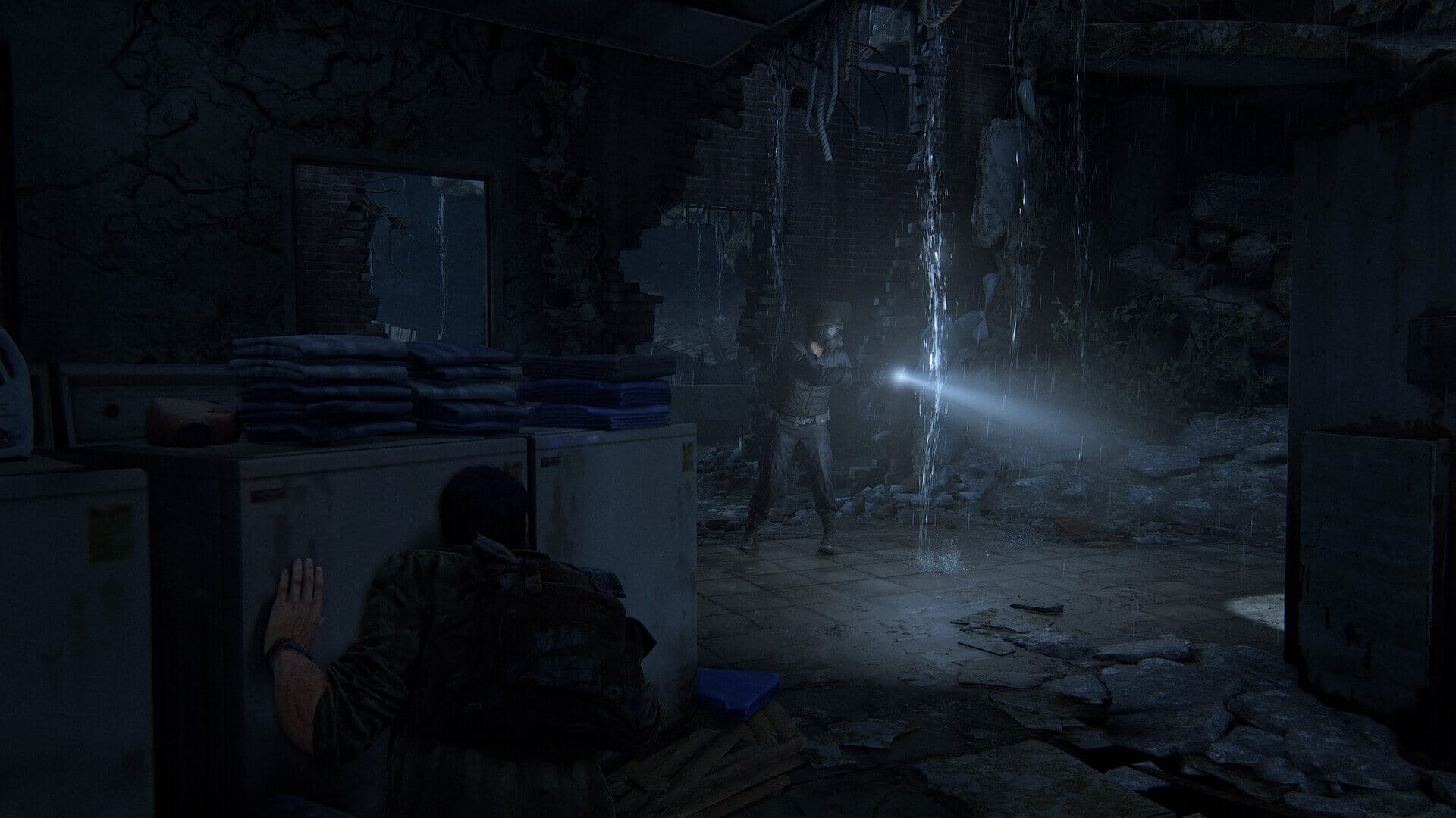 a game character is seen hiding from an armed enemy in a broken building