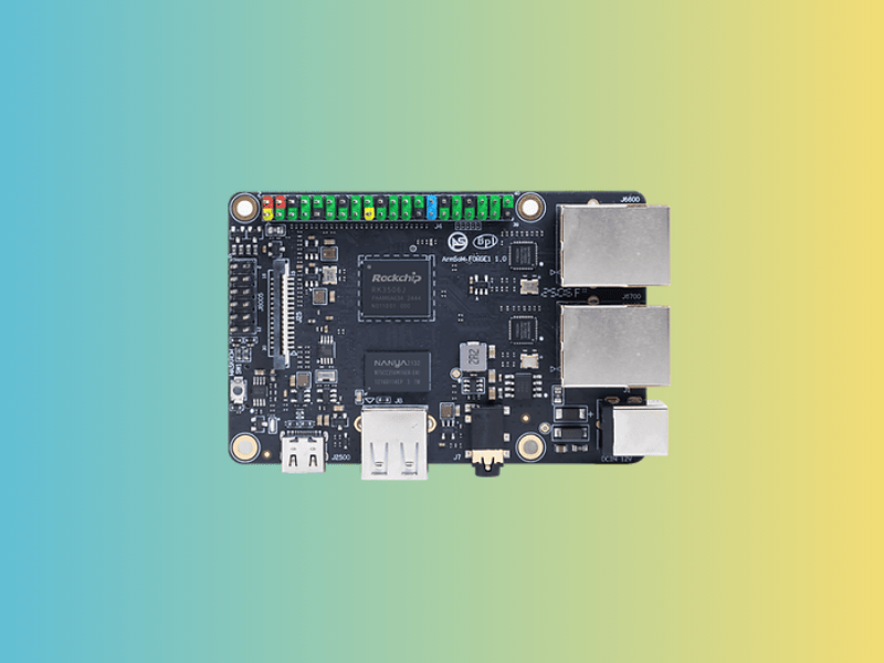 this mixed green background picture shows an armsom forge1 device in the center