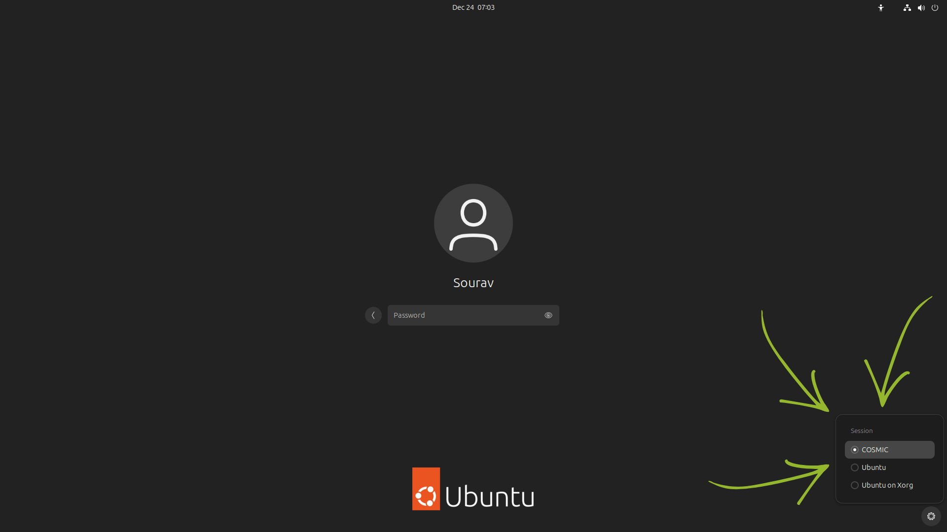 this is a picture of the ubuntu login screen with the session switcher visible on the bottom-right with three green arrows pointing towards it