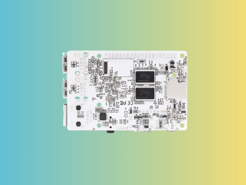 this mixed green background picture shows a le potato aml-s905x-cc device in the center