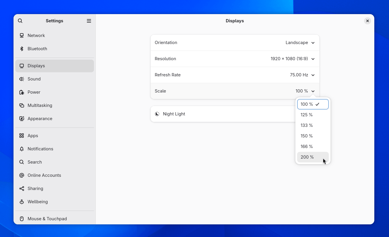 against a blue background, the displays settings menu is showcased here, with the scaling dropdown visible, showing various percentage numbers like 100, 125, 133, 150, 166, and 200