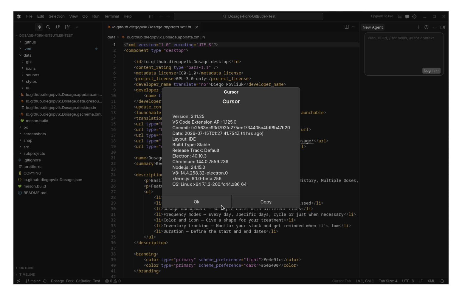 the about dialog of the linux client for cursor is visible in the foreground, the background has the rest of the cursor interface with a wall of code