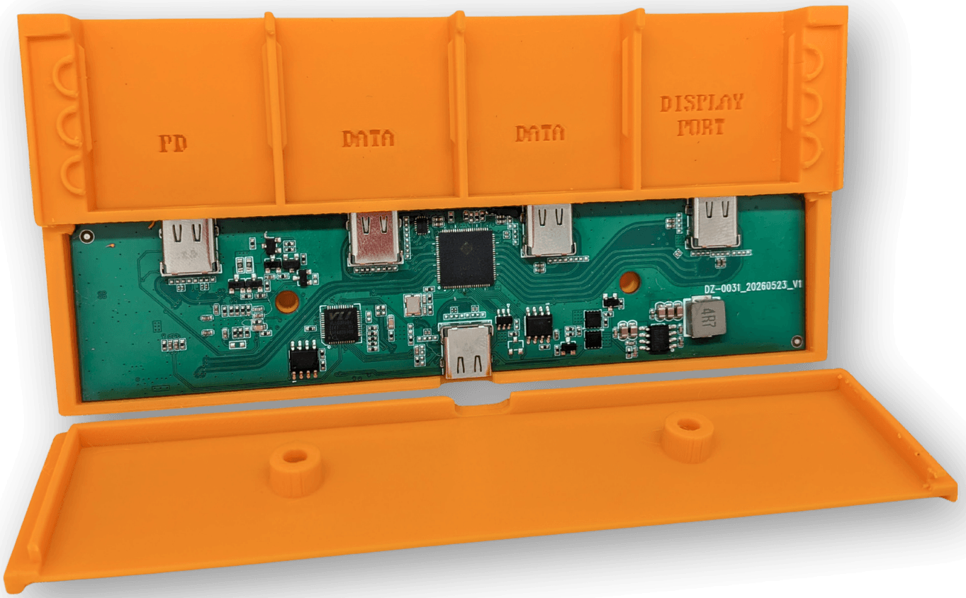 an early view of the dockframe pcb inside an orange case with lego studs on both sides