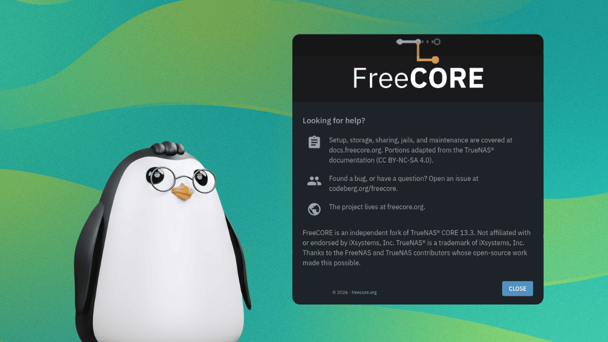 a penguin looks over to a screenshot of freecore's about info dialog