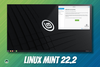 linux mint 22.2 desktop view with the welcome app open above, linux mint 22.2 written in text using a funky font below