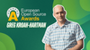 european open source awards logo on the left, on the right is a picture of greg wearing a white/blue t-shirt