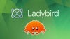 the purple/white-themed ladybird logo is on top, with the unofficial rust crab mascot illustration below it