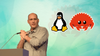 there is a picture of greg kroah-hartman speaking at an even on the left, on the right are tux, the mascot penguin of linux, and a crab, the unofficial mascot of rust
