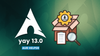 arch linux logo is on the left with the following written below it "yay 13.0 aur helper", on the right is an illustration of a cardboard box, notepad, and magnifying glass